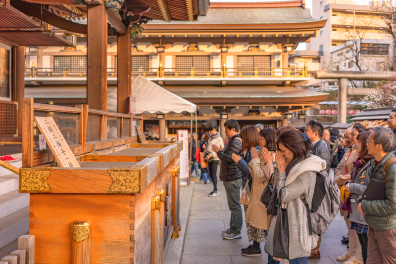 Praying at Japanese Shrine