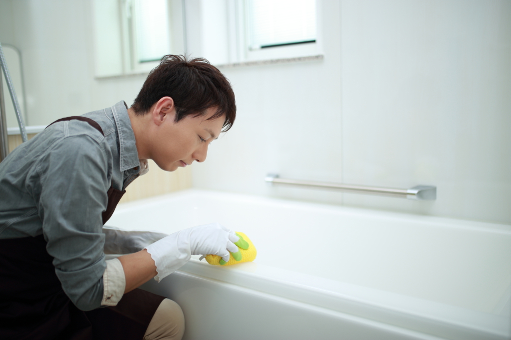 japanese husband cleaning the tub
