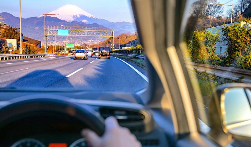 driving a car in japan with mount fuji