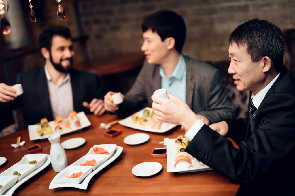 cheers with sake, called nihonshu in Japan